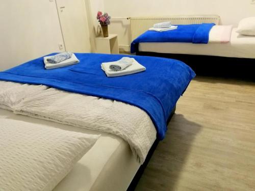 Postel nebo postele na pokoji v ubytování Apartma AS