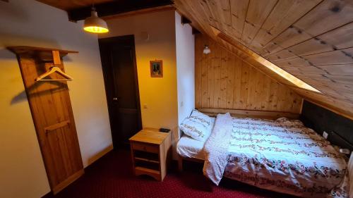 Ένα ή περισσότερα κρεβάτια σε δωμάτιο στο Ilimbav 122 - Guest House