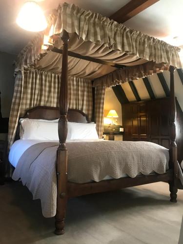Llit o llits en una habitació de Bells Cottage