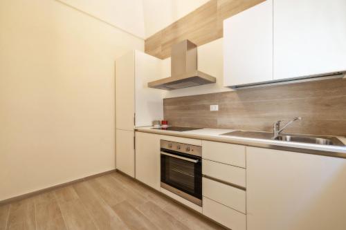 Kuchyň nebo kuchyňský kout v ubytování Aria di Mare Apartments