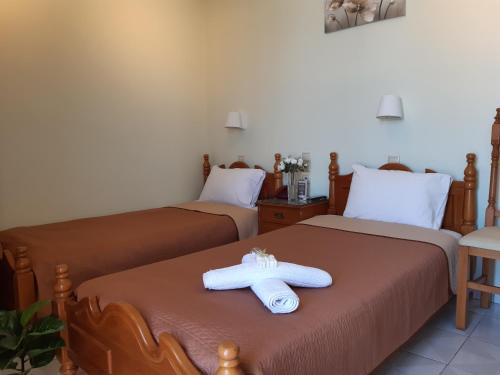 מיטה או מיטות בחדר ב-Hotel Anagennisis