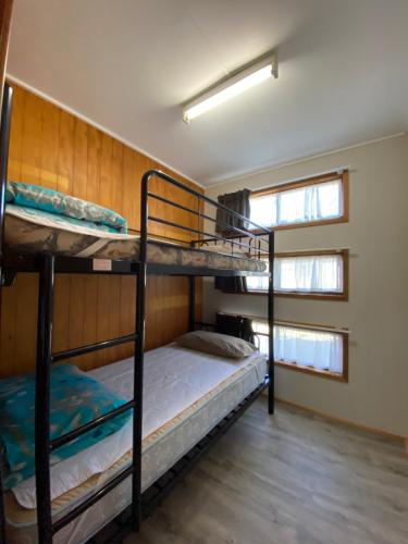 A bunk bed or bunk beds in a room at Twin Dolphins Holiday Park