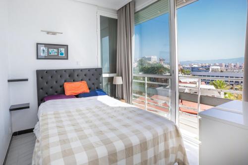 A bed or beds in a room at La Torre De La Roca