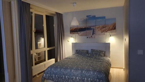 Postel nebo postele na pokoji v ubytování Blue Horizon
