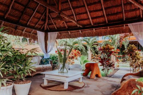 Jardín al aire libre en Villa Pantai Milagres Exclusive Hotel