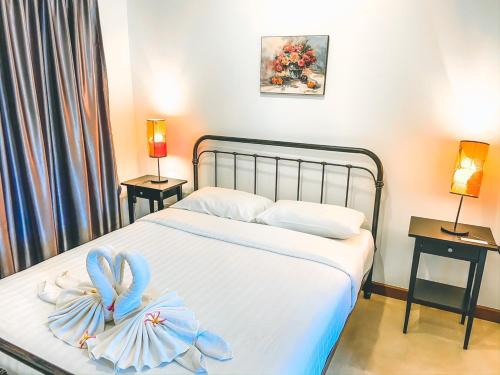 Postel nebo postele na pokoji v ubytování Royal Sammuk Villa