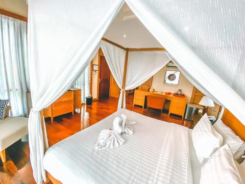 Postel nebo postele na pokoji v ubytování Royal Sammuk Villa