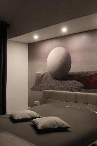 Ένα ή περισσότερα κρεβάτια σε δωμάτιο στο Residence Beau Rivage Brehec
