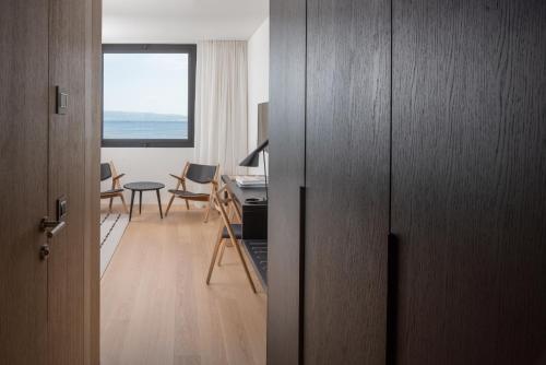 an open door to a room with a desk at briig boutique hotel in Split