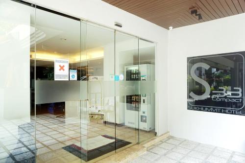 a glass display case in a building at S33 Compact Sukhumvit Hotel in Bangkok