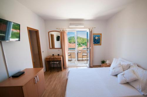 Posteľ alebo postele v izbe v ubytovaní Župa Dubrovačka Guest House