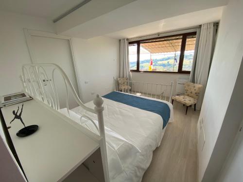 Cama o camas de una habitación en Red House Accomodation Potenza Picena