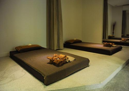 Кровать или кровати в номере Bopha Bassac Boutique Hotel