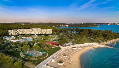 an aerial view of a resort next to the water at Maistra Select Family Hotel Amarin in Rovinj