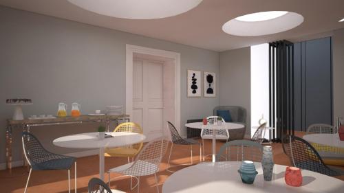 a rendering of a room with tables and chairs at Relais Villa Montedonzelli in Naples