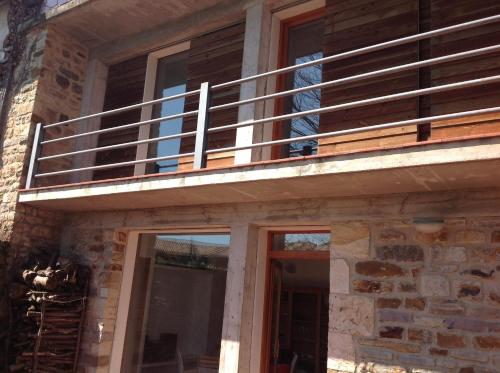 a balcony on the side of a house at Casa Otxandi in Ochandiano