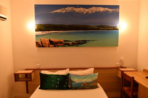 Hôtel Le Claridgeにあるベッド