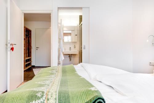 Voodi või voodid majutusasutuse Appartement Valbona Blick by A-Appartments toas