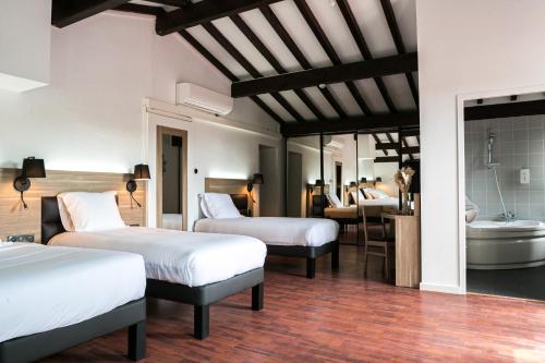 Katil atau katil-katil dalam bilik di Hôtel du Pont