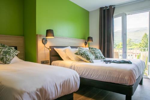 Postel nebo postele na pokoji v ubytování Hôtel du Pont