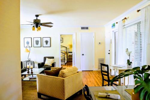 a living room with a couch and a table at Villa Venezia in Fort Lauderdale