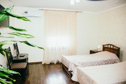 Кровать или кровати в номере Гостиница Рио