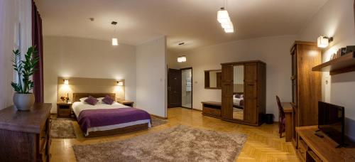 Postel nebo postele na pokoji v ubytování Hotel Star