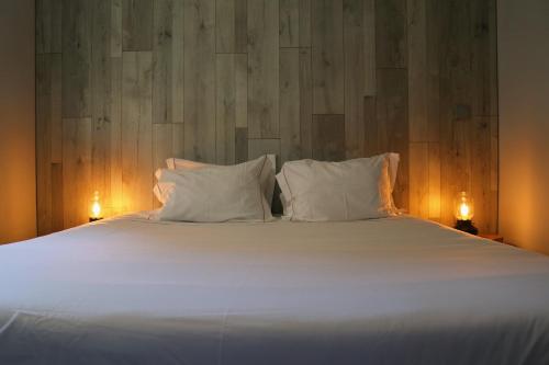 Ένα ή περισσότερα κρεβάτια σε δωμάτιο στο Oportocean Suites