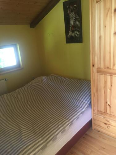 Posteľ alebo postele v izbe v ubytovaní Zebra
