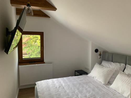 Posteľ alebo postele v izbe v ubytovaní SEN NA MIŁEJ - APARTAMENTY przy PLAŻY - GDAŃSK BRZEŹNO