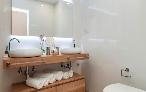 Et badeværelse på Flamboyant Tree Garden Holiday Home