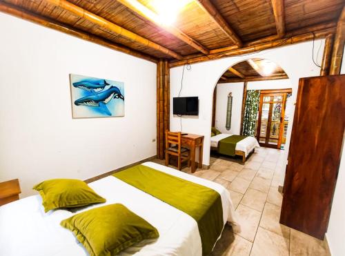Postel nebo postele na pokoji v ubytování Tuzco Lodge
