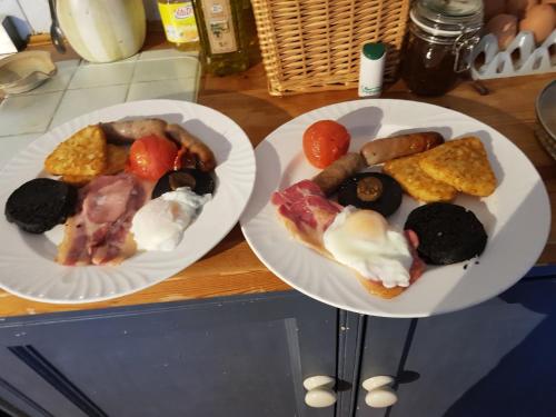 two plates of food on top of a counter at Low Gingerfield Farm B&B in Richmond