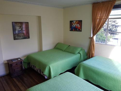 Postel nebo postele na pokoji v ubytování Petite Maison