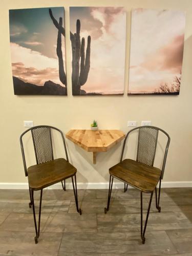 two chairs and a table in a room at Sedona Village Lodge in Sedona