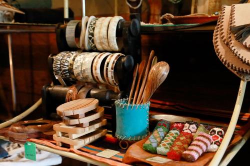 a table with a bunch of wooden spoons and other items at Pension Kamifuji in Osaki
