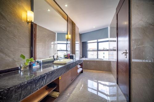 Koupelna v ubytování Relteem Hotel