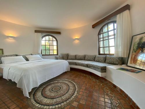 A bed or beds in a room at Pyrgi Spetses