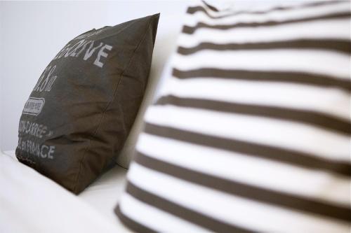 Katil atau katil-katil dalam bilik di Vilnius Apartments & Suites