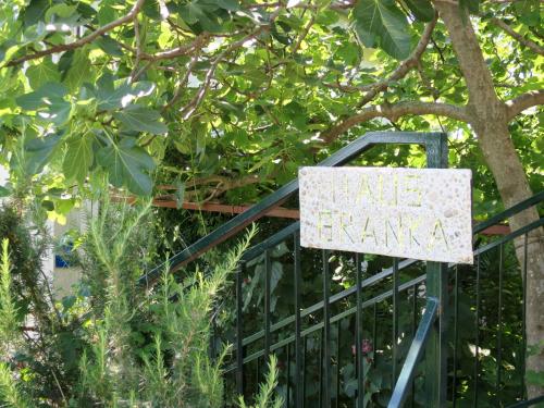 a sign that says walk frame in a garden at Apartment Branka-1 by Interhome in Mošćenice