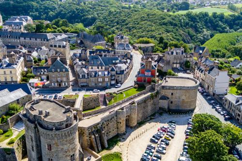 an aerial view of a town with a castle at Hôtel du Château Dinan - Originals Boutique in Dinan