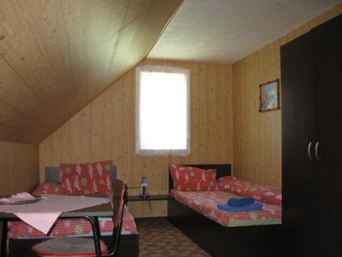Postel nebo postele na pokoji v ubytování Podina Guest House