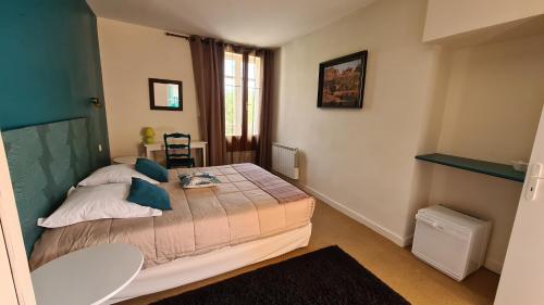 Ein Bett oder Betten in einem Zimmer der Unterkunft ALYSA