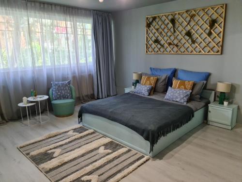 Postel nebo postele na pokoji v ubytování Zorilor Cactus Apartment