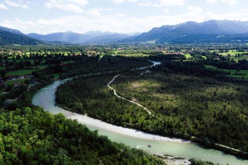 an aerial view of a river and forests at Zur Weberei in Bad Tölz