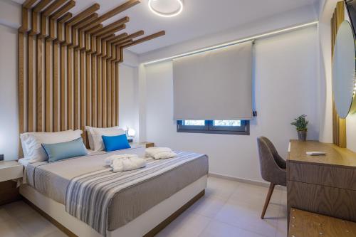 Ένα ή περισσότερα κρεβάτια σε δωμάτιο στο BISALTAE SEASIDE SUITES