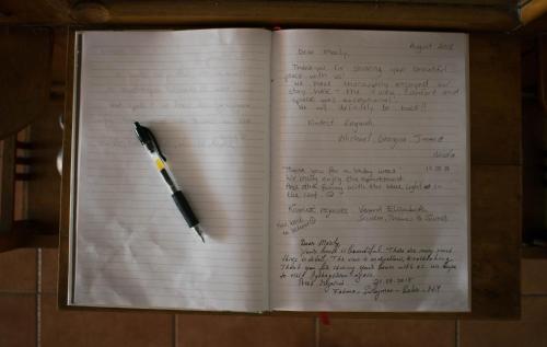 an open notebook with a pen on it at Dolichi View in Pythagoreio