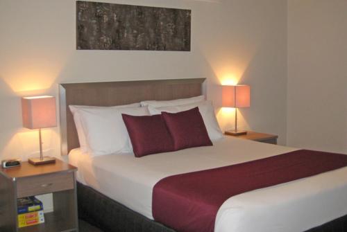 Ένα ή περισσότερα κρεβάτια σε δωμάτιο στο Johnson Road Motel