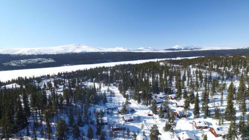 an aerial view of a ski resort in the snow at Fjällriket Baggården in Baggården