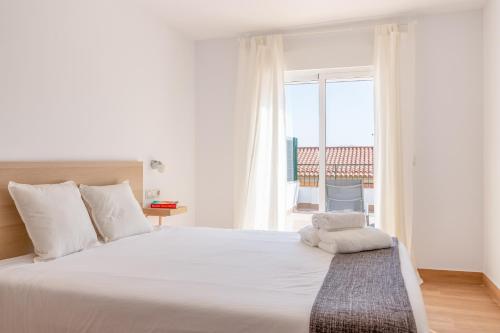 Posteľ alebo postele v izbe v ubytovaní FUN BUILDING TERRACES by HOMEABOUT
